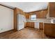 This kitchen features wood cabinets, countertops and white appliances at 717 Fairfield St, Burlington, NC 27215