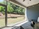Screened-in porch featuring outdoor seating and a view of the backyard at 725 Banningford Rd, Cary, NC 27518