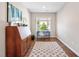 Office space featuring hardwood floors and natural light at 7700 Stonehenge Farm Ln, Raleigh, NC 27613