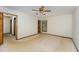 Spacious bedroom featuring neutral walls, a ceiling fan, and natural light from a window at 8409 Crowder Rd, Raleigh, NC 27603