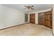 Bedroom with carpet, ceiling fan, and natural light from the window at 8409 Crowder Rd, Raleigh, NC 27603