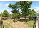 Well maintained backyard featuring a garden and bordered by a wire fence and privacy fence at 870 Kentucky Derby Ln, Lillington, NC 27546