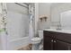 Cozy bathroom with combination tub and shower, decorative shower curtain, and vanity at 870 Kentucky Derby Ln, Lillington, NC 27546