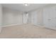 This bedroom features neutral paint, carpet, and access to an ensuite at 870 Kentucky Derby Ln, Lillington, NC 27546