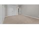 Bedroom featuring carpet flooring and a closet with white doors at 870 Kentucky Derby Ln, Lillington, NC 27546