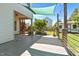 Relaxing outdoor deck with a shaded area, overlooking the spacious backyard and lush greenery at 870 Kentucky Derby Ln, Lillington, NC 27546