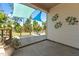 Covered patio with views of the surrounding greenery and backyard, perfect for enjoying the outdoors in comfort at 870 Kentucky Derby Ln, Lillington, NC 27546