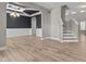 Dining room with wainscoting, coffered ceiling, and luxury vinyl plank flooring at 870 Kentucky Derby Ln, Lillington, NC 27546