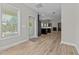 Hallway view leading into the kitchen and living room area at 870 Kentucky Derby Ln, Lillington, NC 27546