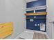 This is a convenient laundry room with shelving, and space to do all your necessary laundry tasks at 870 Kentucky Derby Ln, Lillington, NC 27546