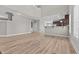 Spacious living room with open floor plan, luxury vinyl plank flooring, and neutral paint at 870 Kentucky Derby Ln, Lillington, NC 27546