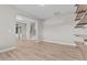 Spacious living room featuring wood floors, neutral colors, and an arched entryway at 870 Kentucky Derby Ln, Lillington, NC 27546
