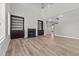 Bright living room features a fireplace, built-in shelving, and hardwood floors at 870 Kentucky Derby Ln, Lillington, NC 27546