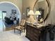 Welcoming foyer showcasing elegant furnishings and a glimpse into the adjacent living space at 8733 Crowder Rd, Raleigh, NC 27603