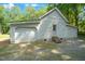 Attached garage with room for two cars, offering plenty of space for vehicles and storage at 8733 Crowder Rd, Raleigh, NC 27603