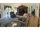 Spacious living room featuring a large entertainment center and comfortable seating arrangements at 8733 Crowder Rd, Raleigh, NC 27603