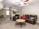 Spacious bonus room featuring soft carpet, leather furniture and blue LED strip lighting at 91 E Walker Woods Ln, Clayton, NC 27527