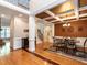 Spacious dining room with hardwood floors, coffered ceiling, and elegant chandelier at 91 E Walker Woods Ln, Clayton, NC 27527