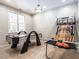 Spacious game room featuring a air hockey and basketball game, perfect for Gathering fun at 91 E Walker Woods Ln, Clayton, NC 27527