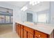 Large double vanity bathroom with a view to the bedroom space at 1005 Fulbright Dr, Morrisville, NC 27560