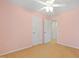 Neutral bedroom with neutral carpet, a ceiling fan, and a closet at 1005 Fulbright Dr, Morrisville, NC 27560