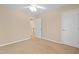 Bedroom featuring a ceiling fan, carpet, and a doorway leading to the hallway at 1005 Fulbright Dr, Morrisville, NC 27560