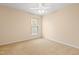 Neutral bedroom with neutral carpet, a ceiling fan, and a window at 1005 Fulbright Dr, Morrisville, NC 27560