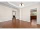 Open living area showcasing hardwood floors, decorative columns, and recessed lighting at 1005 Fulbright Dr, Morrisville, NC 27560