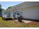 Backyard patio with grill and deck provides a great space for outdoor dining and relaxation at 1009 Open Field Dr, Garner, NC 27529