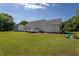 Spacious backyard offers ample space for outdoor activities and entertaining, featuring a small deck at 1009 Open Field Dr, Garner, NC 27529