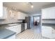 Well-maintained kitchen features stainless steel appliances and stylish gray countertops at 1009 Open Field Dr, Garner, NC 27529