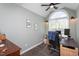 Cozy home office with a vaulted ceiling, modern decor, and natural light at 1009 Open Field Dr, Garner, NC 27529