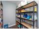 Organized storage room with metal shelving units, perfect for pantry goods and household essentials at 1009 Open Field Dr, Garner, NC 27529