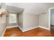 Attic bedroom with hardwood floors, a window with natural light, and trim on the walls at 103 E Meadowbrook Dr, Smithfield, NC 27577