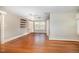 Spacious bedroom with hardwood floors, neutral tones, and ample closet space at 103 E Meadowbrook Dr, Smithfield, NC 27577