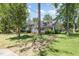 Charming two-story home with a landscaped front yard and dormer windows at 103 E Meadowbrook Dr, Smithfield, NC 27577