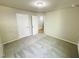 Spacious bedroom with a neutral color scheme, plush carpeting, and convenient closet access at 107 Earnest Way, Kenly, NC 27542
