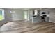 Modern kitchen featuring stainless steel appliances, granite countertops, gray cabinets, and an island at 107 Earnest Way, Kenly, NC 27542