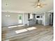 This home boasts a view of the kitchen and living room at 107 Earnest Way, Kenly, NC 27542