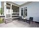 Charming backyard with a screened-in porch, deck, and comfortable outdoor seating at 110 Stoney Dr, Durham, NC 27703