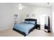 Cozy bedroom featuring neutral walls, plush carpeting, and a comfortable bed with matching bedside tables at 110 Stoney Dr, Durham, NC 27703