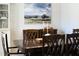 Elegant dining room with a large table, wooden chairs, and stylish decor for entertaining guests at 110 Stoney Dr, Durham, NC 27703