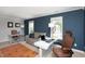 Spacious office featuring neutral colors, large desk, and cozy seating area at 110 Stoney Dr, Durham, NC 27703