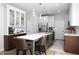 Modern kitchen featuring a large island, stainless steel appliances, and ample cabinet space at 110 Stoney Dr, Durham, NC 27703