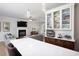 Open-concept kitchen featuring an eat-in island, granite countertops, and stainless steel appliances at 110 Stoney Dr, Durham, NC 27703