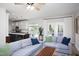 Open-concept living space with combined kitchen and living areas and features lots of natural light at 110 Stoney Dr, Durham, NC 27703