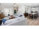 Open living room with hardwood floors, stylish furniture, and an airy atmosphere for relaxed living at 110 Stoney Dr, Durham, NC 27703