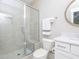 Modern bathroom with tile shower, glass door, and vanity with marble countertop at 1180 Duke Farm Dr, Wake Forest, NC 27587