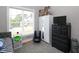 Comfortable bedroom with a dresser and large window, offering a cozy and bright space at 1180 Duke Farm Dr, Wake Forest, NC 27587
