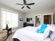 Light filled bedroom featuring a ceiling fan and plenty of natural light at 1180 Duke Farm Dr, Wake Forest, NC 27587